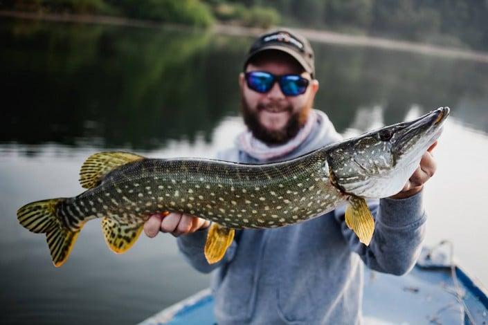 Robert on boat with a nice pike caught with L16 Shad 